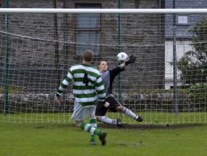 Spurs keeper Kyle Duncan tries in vain to stop the winning goal in the penalty shootout, scored by Celtic's Joel Bradley. Photo: Kevin Jones Click on image to enlarge.