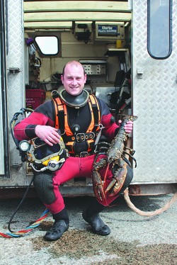 Ocean Kinetics diver Chris Watt with Auld Rock. Photo: Donald Jeffries