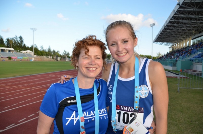 Emma Leask celebrating her 400m silver with athletics team manager Karen Woods. Photo: Andrew Inkster