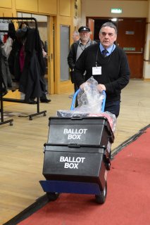 Billy Sansilands wheels in the postal ballot boxes.