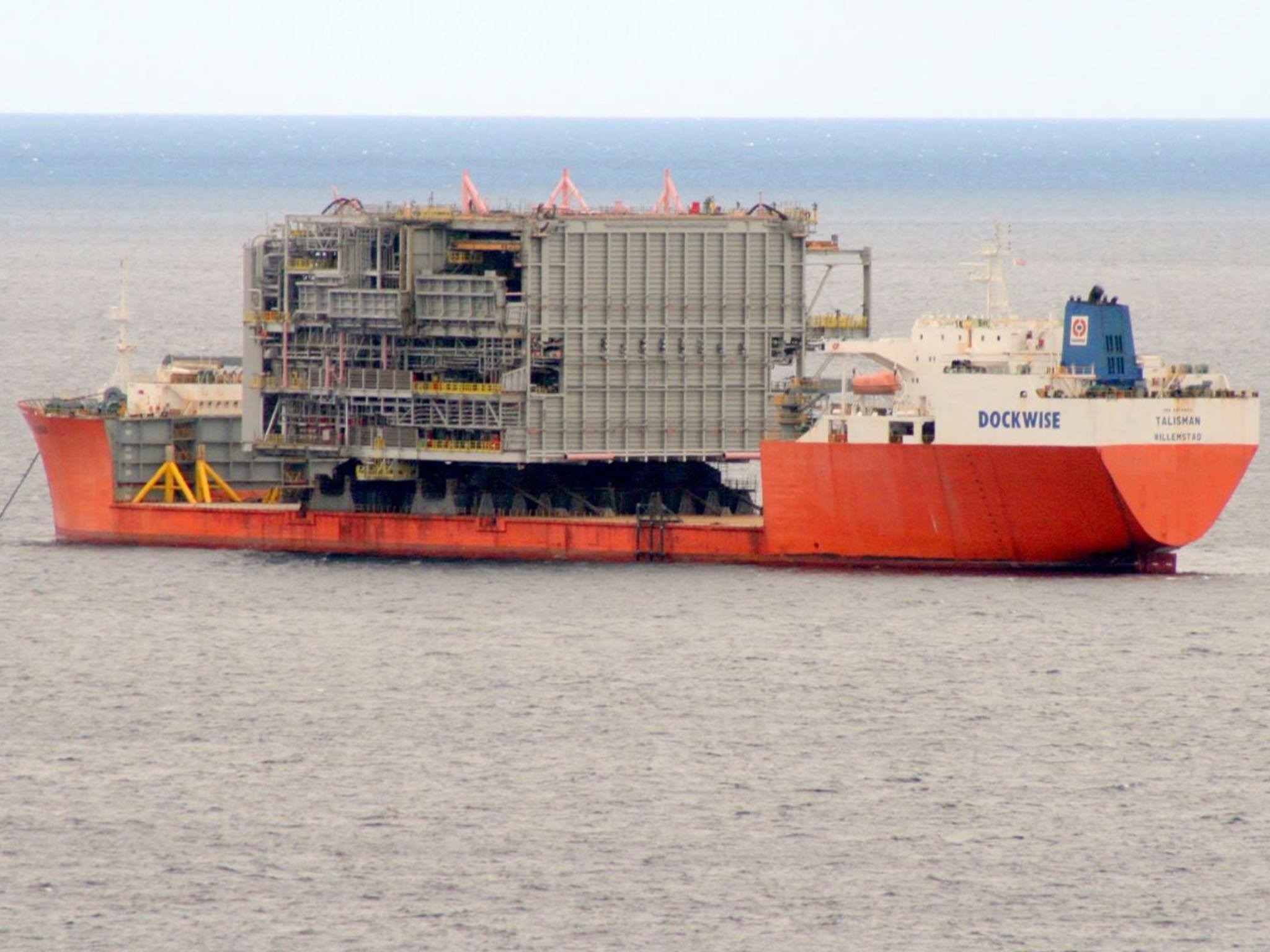Trasnport vessels the Talisman with her access modules and a structure for the Clare Ridge platforms