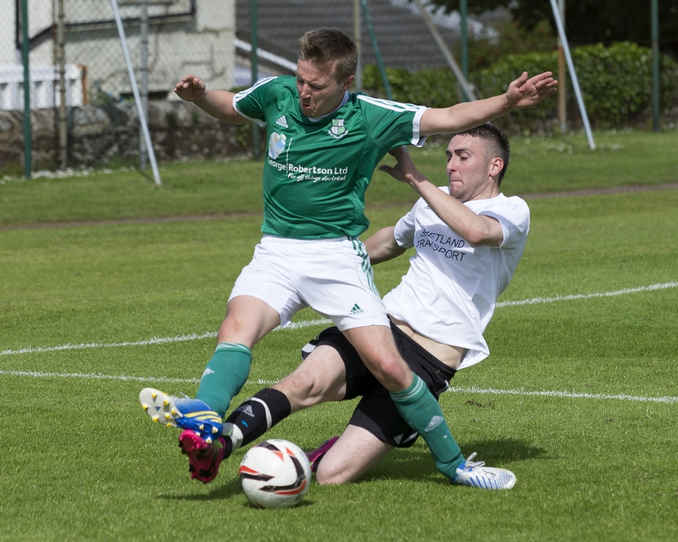 Spurs' Andrew Flett challenges Celtic's Tom Moncrieff during yesterday's Simpson and Ward Manson Cup Final at the Gilbertson Park. Photo: Kevin Jones