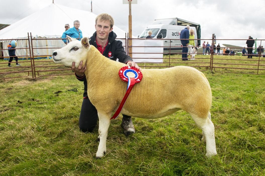 During cattle judging, Tom Rendall was crowned overall champion with his texel gimmer.